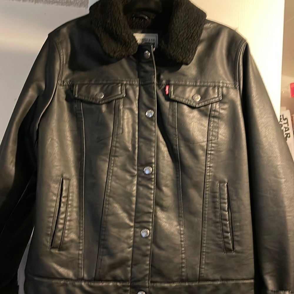 Levi’s leather jacket with fleece inside. Tags removed but never worn.